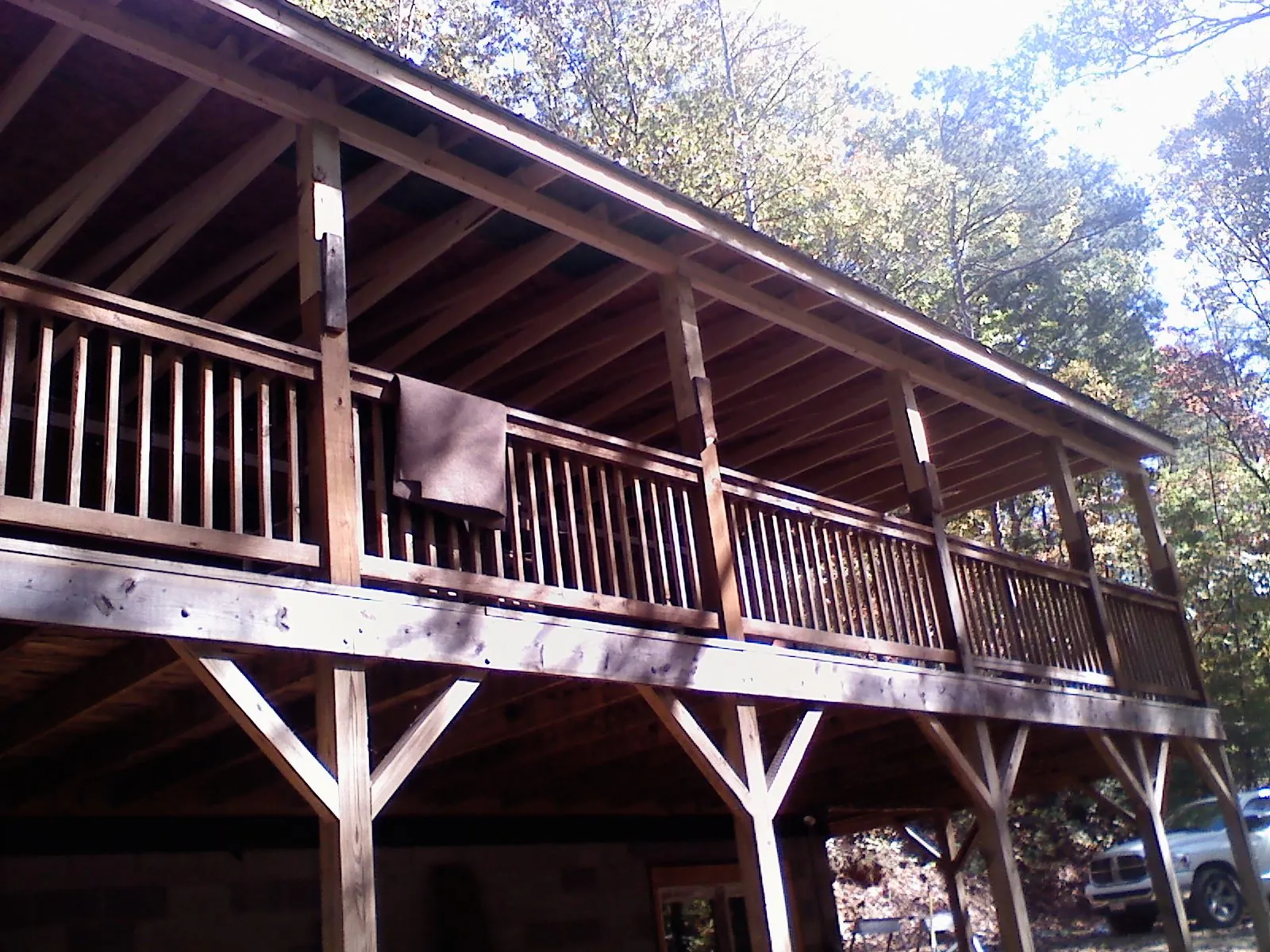Timber framing under a new elevated porch and deck — Roof Leak Repair in Hugo by Roofing Brothers